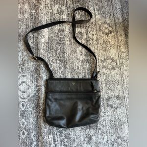 Fossil black leather cross body bag.